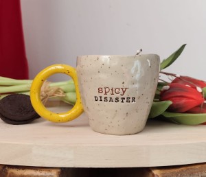 Kubek z napisem : SPICY DISASTER, lepiony ręcznie ok 200 ml 41/03